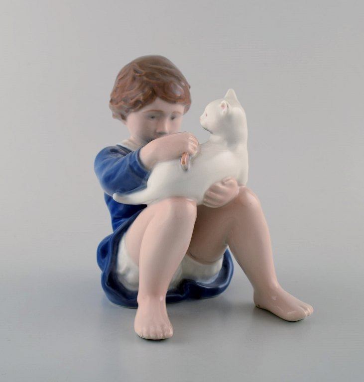 Rare Royal Copenhagen Figure, girl with cat.
