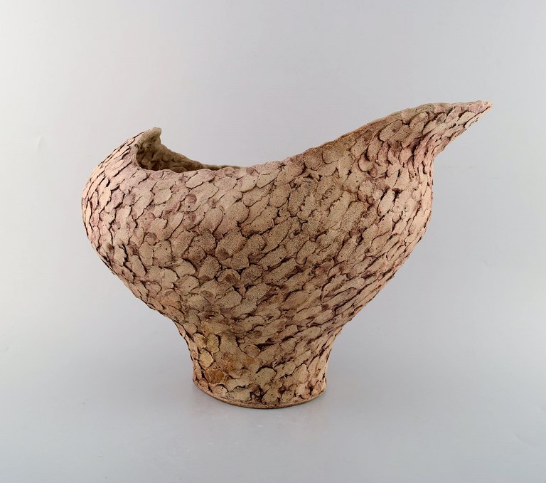 Ivy Lysdal, b. 1937. Danish ceramist and painter.
Large unique vase in organic shape. glaze in earth tones. 1970