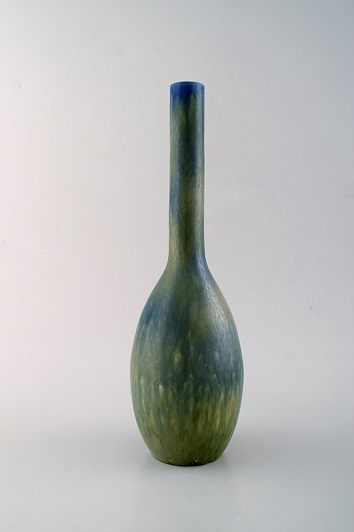 Carl-Harry Stålhane for Rørstrand. Large ceramic vase with narrow neck. 
Beautiful glaze in blue / green shades. 1960