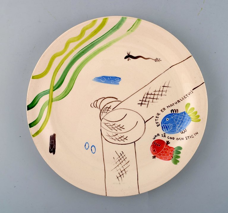 Stig Lindberg for Gustavsberg. "Löja" plate. Hand painted with fish motifs. 
1950