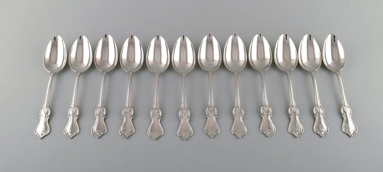 Hallbergs Guldsmeds Ab, Sweden. Set of twelve "Olga" table / soup spoons. Dated 
1946.
