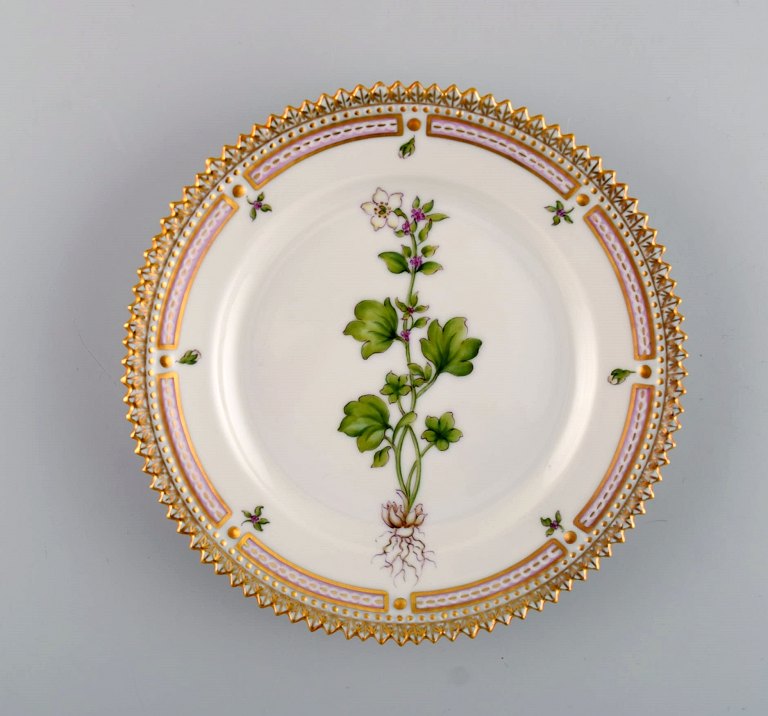 Royal Copenhagen Flora Danica side plate in hand-painted porcelain with flowers 
and gold decoration. Model number 20/3552.
