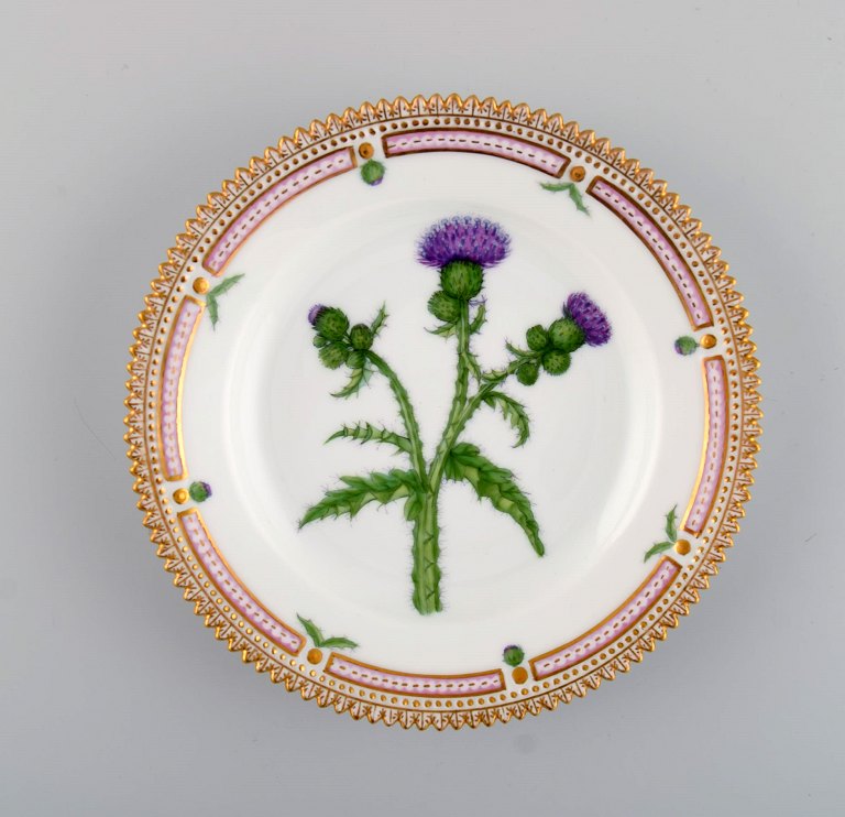 Royal Copenhagen Flora Danica dessert plate in hand-painted porcelain with 
flowers and gold decoration. Model number 20/3551.
