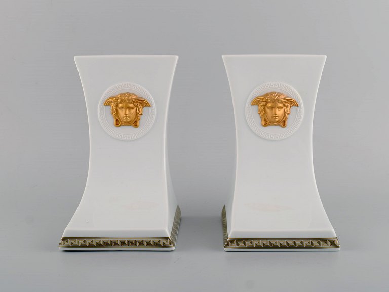 Gianni Versace for Rosenthal. Two Gorgona bookends in white porcelain with gold 
decoration. Late 20th century.
