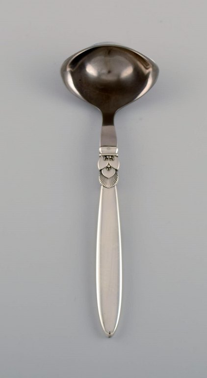 Georg Jensen Cactus sauce spoon in sterling silver and stainless steel.
