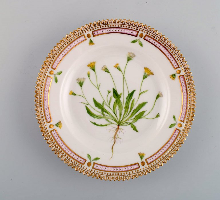 Royal Copenhagen Flora Danica dessert plate in hand-painted porcelain with 
flowers and gold decoration. Model number 20/3551.
