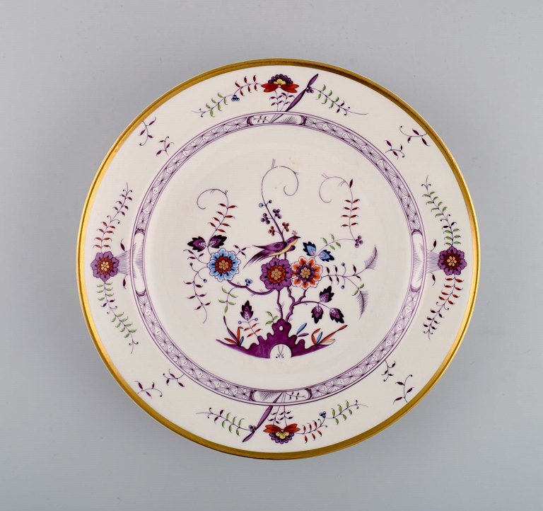 Meissen porcelain plate with hand-painted foliage, birds and gold decoration. 
Dated 1942.
