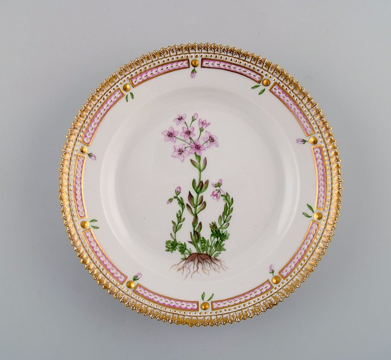 Royal Copenhagen Flora Danica salad plate in hand-painted porcelain with flowers 
and gold decoration. Model number 20/3573.
