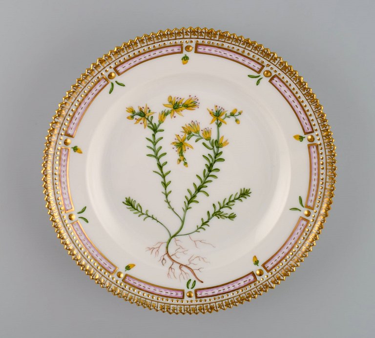 Royal Copenhagen Flora Danica salad plate in hand-painted porcelain with flowers 
and gold decoration. Model number 20/3573.
