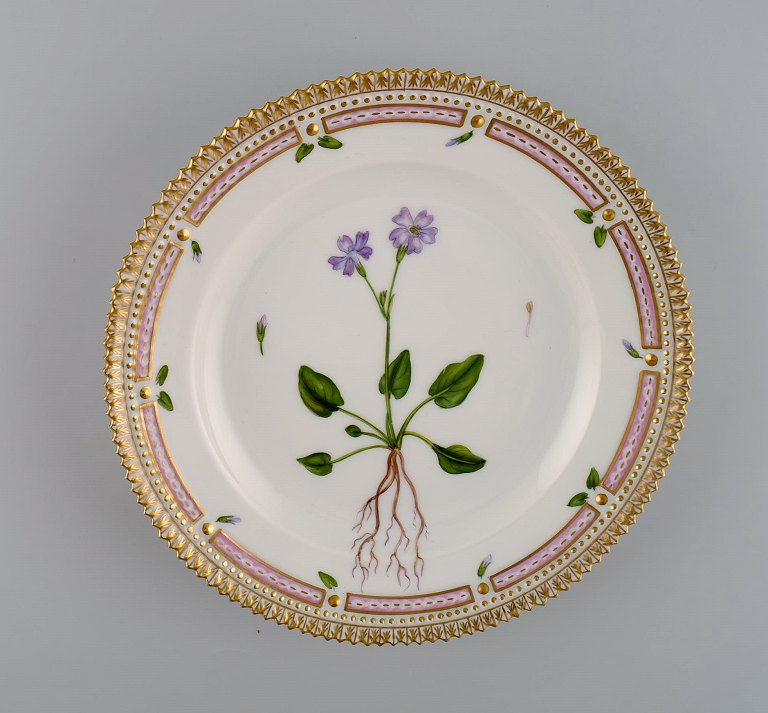 Royal Copenhagen Flora Danica salad plate in hand-painted porcelain with flowers 
and gold decoration. Model number 20/3573.
