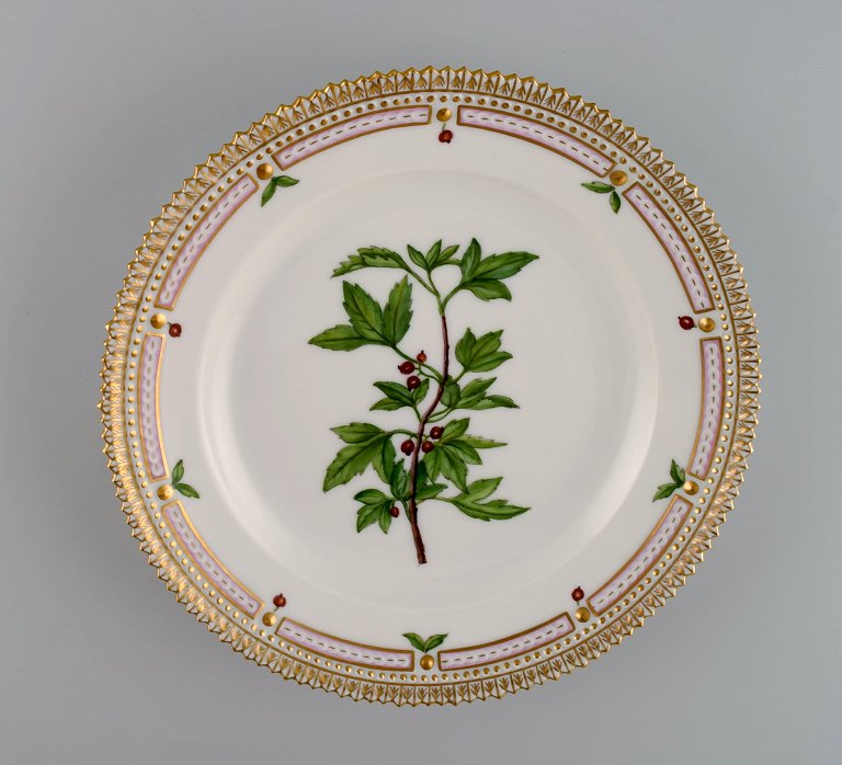 Royal Copenhagen Flora Danica salad plate in hand-painted porcelain with flowers 
and gold decoration. Model number 20/3573.
