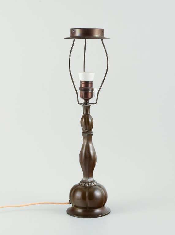 Just Andersen (1884-1943). Table lamp in patinated "disko" metal.