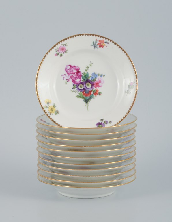 B&G, Bing & Grondahl Saxon flower.
12 cake plates decorated with flowers and gold trim.