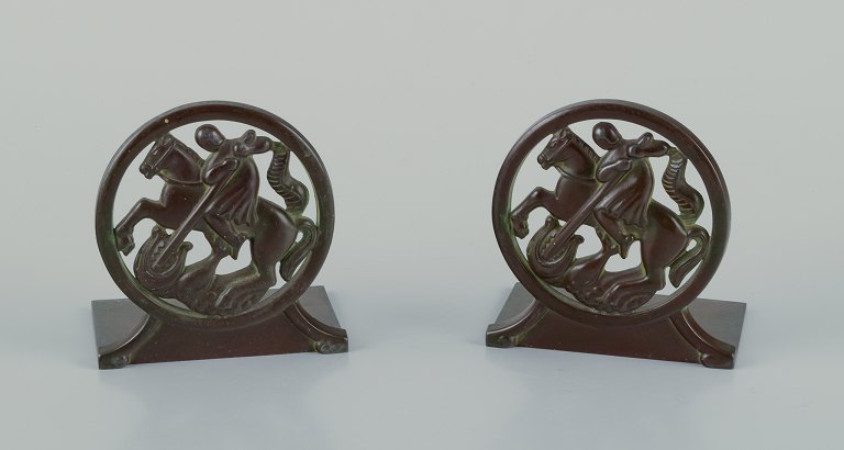 Just Andersen, Denmark. A pair of Art Deco bookends in "disko" metal .