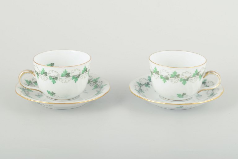 Herend, Hungary
2 demitasse cups with saucers, mid-20th century.