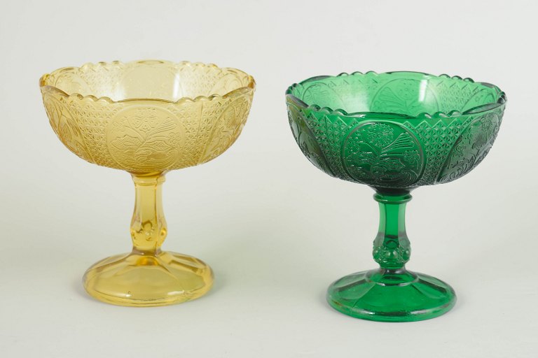 Pair of pressed glass dessert bowls on foot.