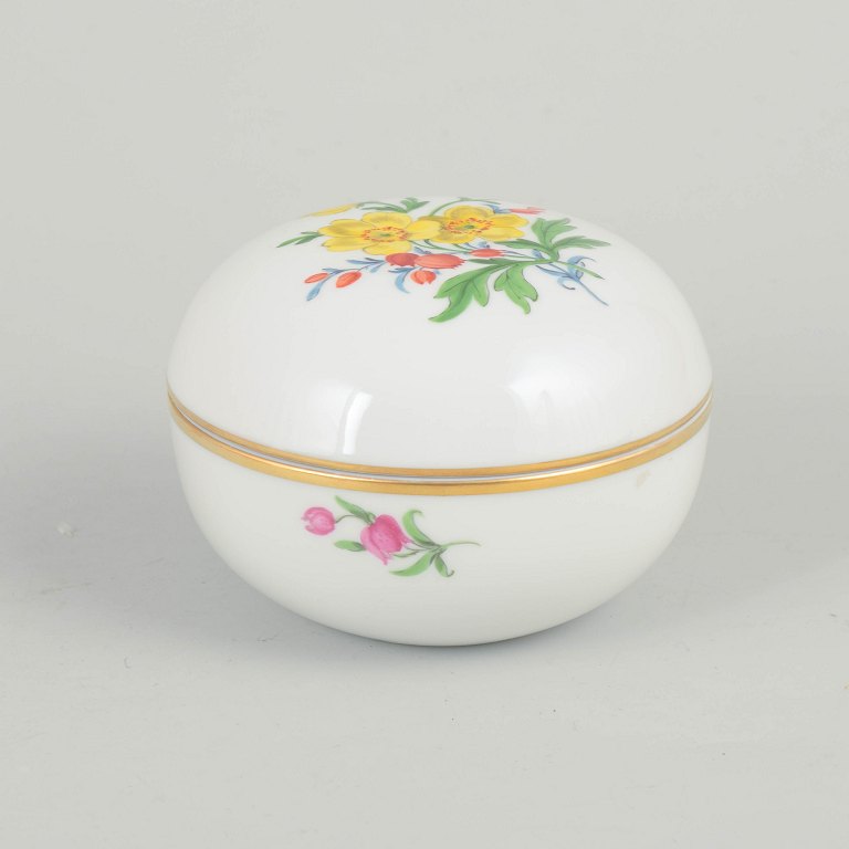 Meissen, lidded jar with polychrome flower decoration.