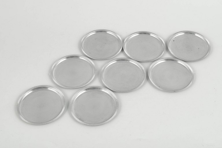 Just Andersen, set of eight coasters in pewter.