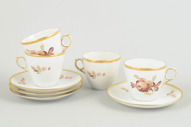 Royal Copenhagen brown rose, set of four coffee cups with saucers.