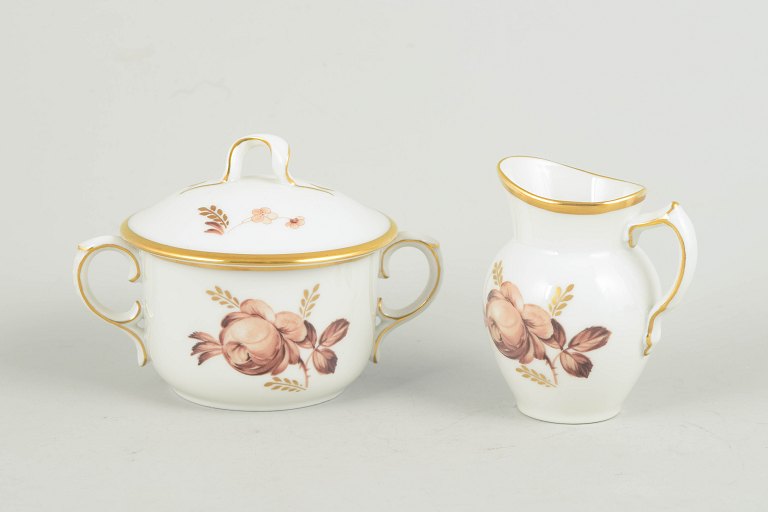 Royal Copenhagen brown rose, creamer and sugar bowl.
